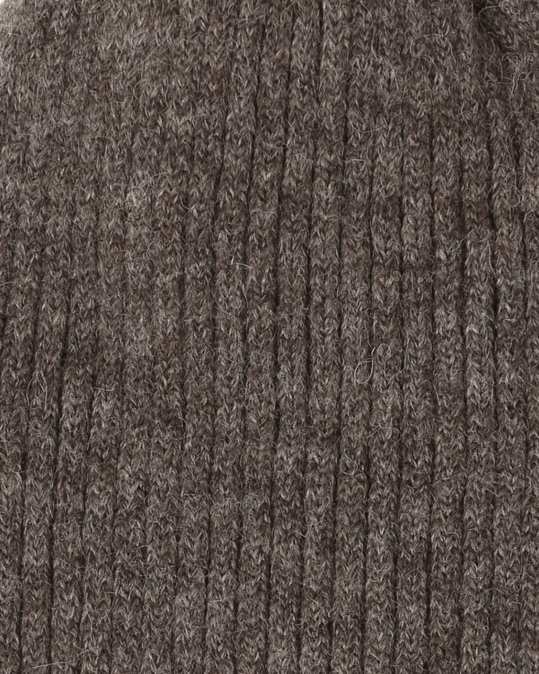 Close-up of the Belacaro kids beanie in brown baby alpaca, showing the soft ribbed knit texture.