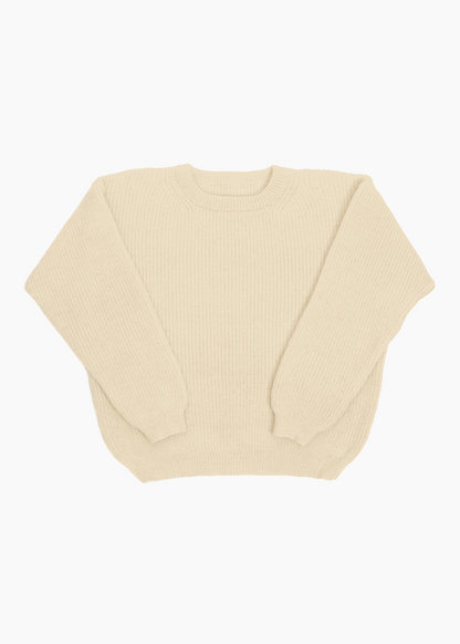 Still life of the off-white Beaurivage sweater, handcrafted from Canadian wool, from Beaurivage farm