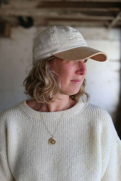 Off-white Beaurivage sweater worn by the farmer who produced this wool, in portrait