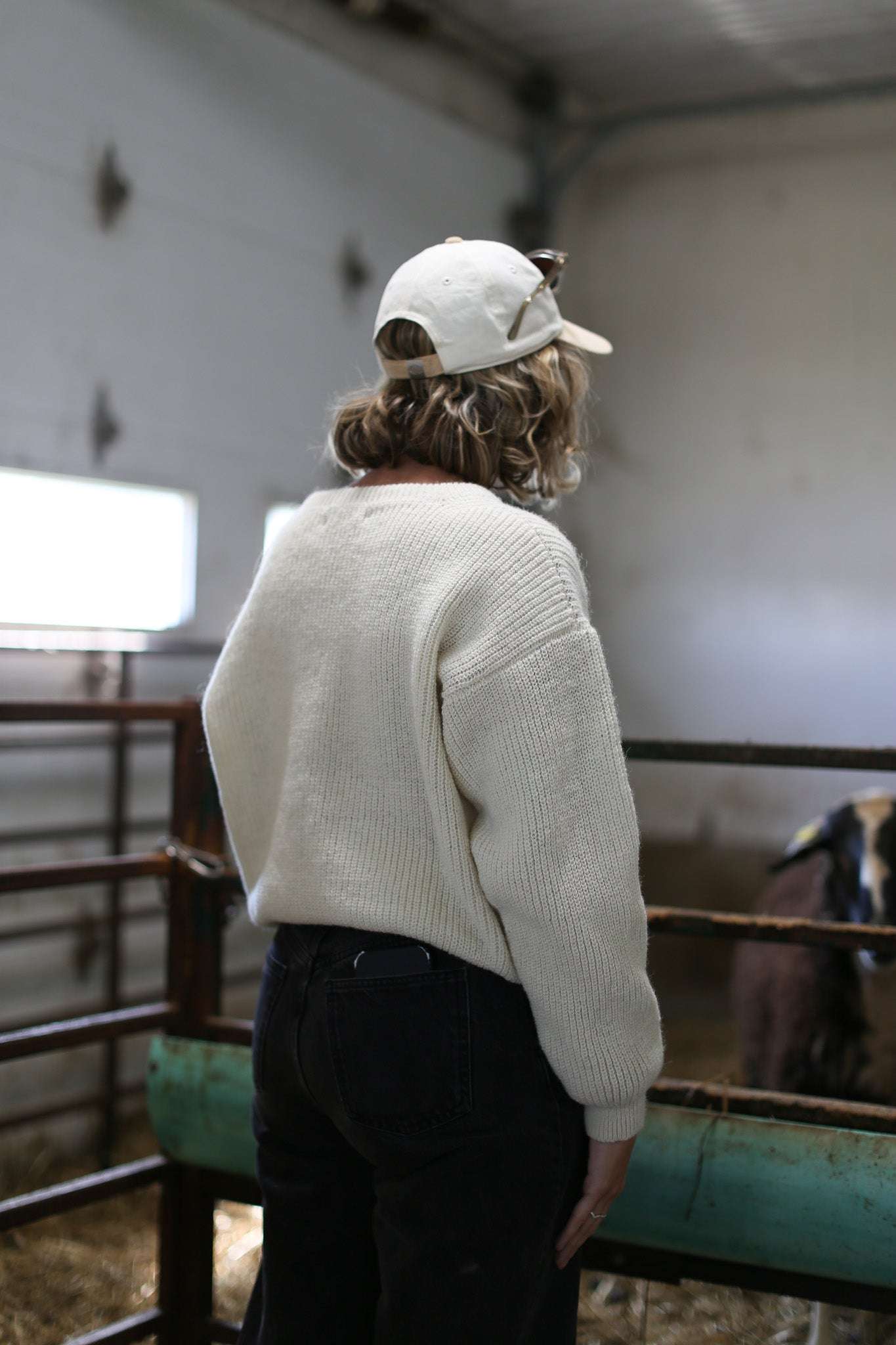 Off-white Beaurivage sweater worn by the farmer who produced this wool, from behind