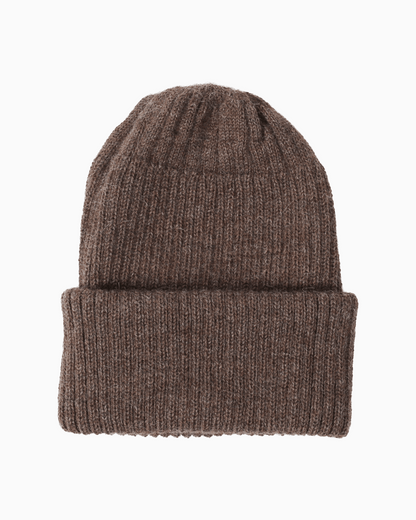 A ribbed alpaca knit beanie hat in a brown color, shown flat against a solid white background.