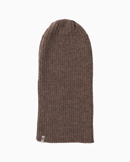 A ribbed alpaca knit beanie hat unrolled in a brown color, shown flat against a solid white background.