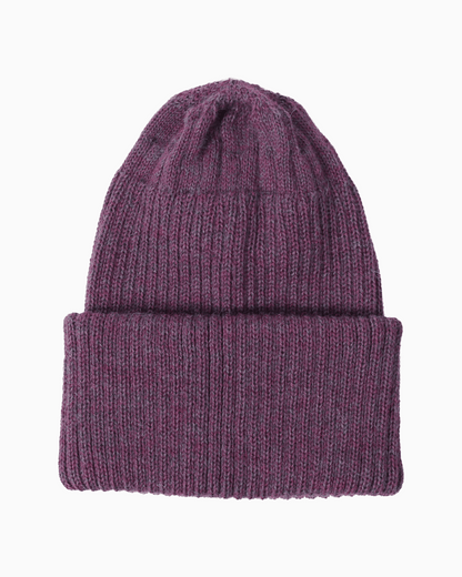 A ribbed alpaca knit beanie hat in a purple color, shown flat against a solid white background.