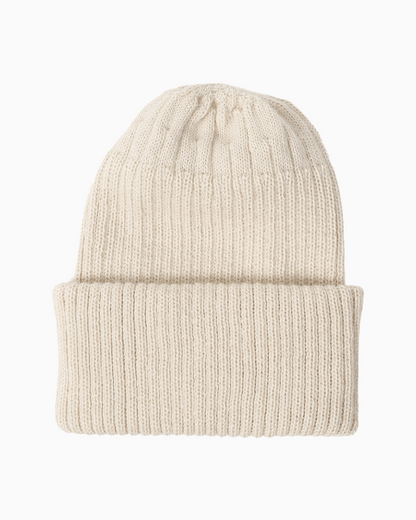 A ribbed alpaca knit beanie hat in a white color, shown flat against a solid white background.