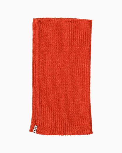packshot of an orange alpaca knitted neck warmer against a white background