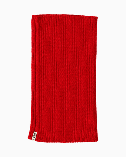packshot of an red alpaca knitted neck warmer against a white background