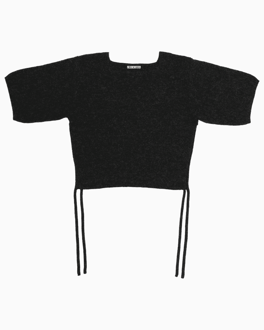 Black belacaro baby alpaca knit top with short sleeves and drawcord ties, flat lay on white background.