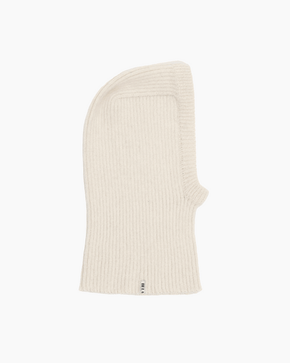Packshot of a white ribbed baby balaclava