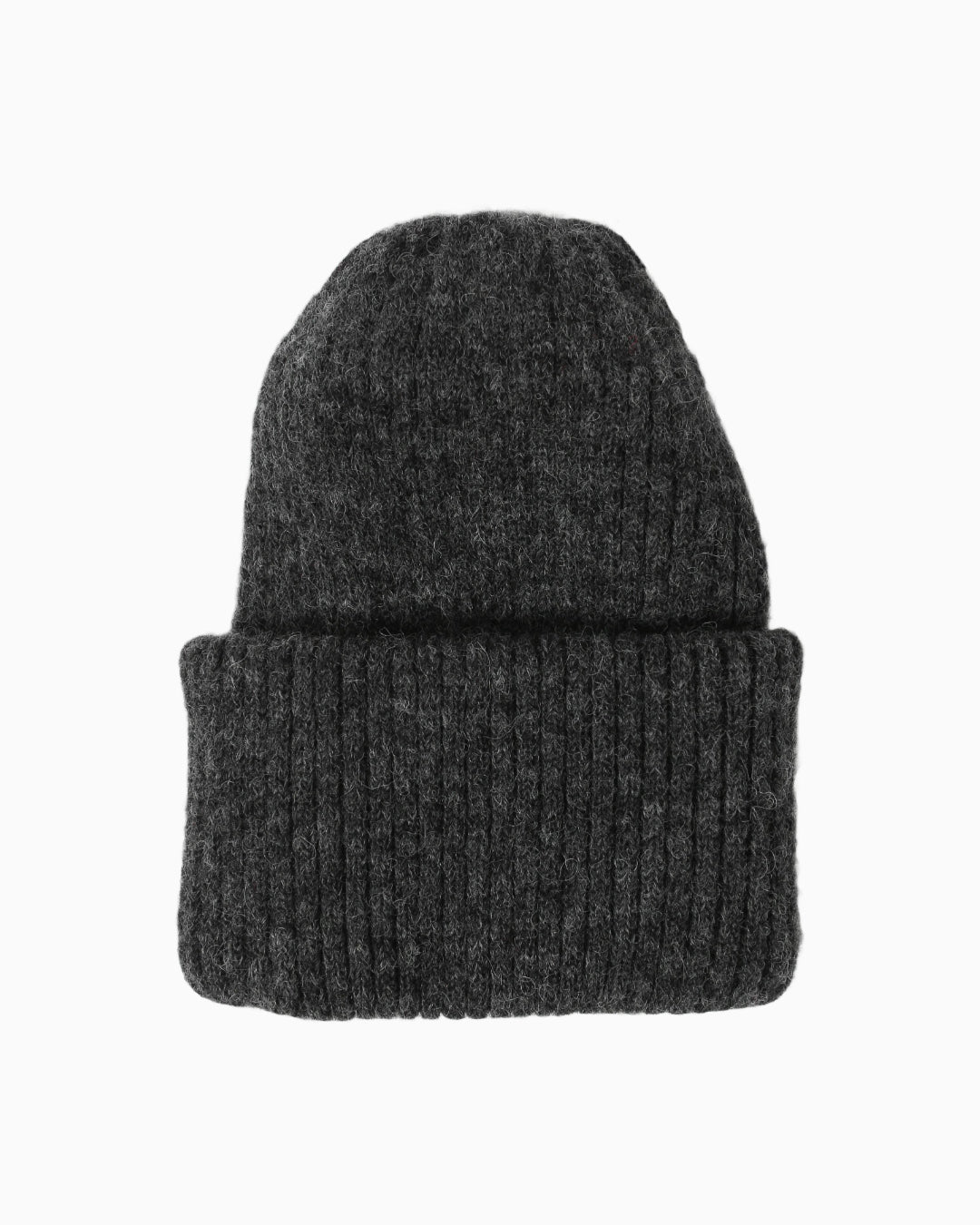 Belacaro beanie in dark grey baby alpaca, thick ribbed knit with folded brim, flat lay on white background.