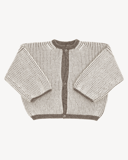 A bicolor brown and white cardigan with a ribbed texture, 3 buttons down the front and wide 3/4 sleeves