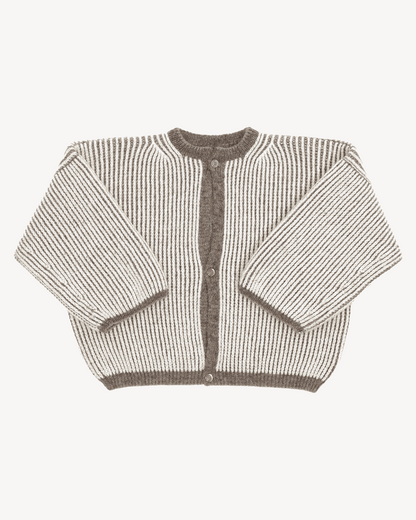 A bicolor brown and white cardigan with a ribbed texture, 3 buttons down the front and wide 3/4 sleeves