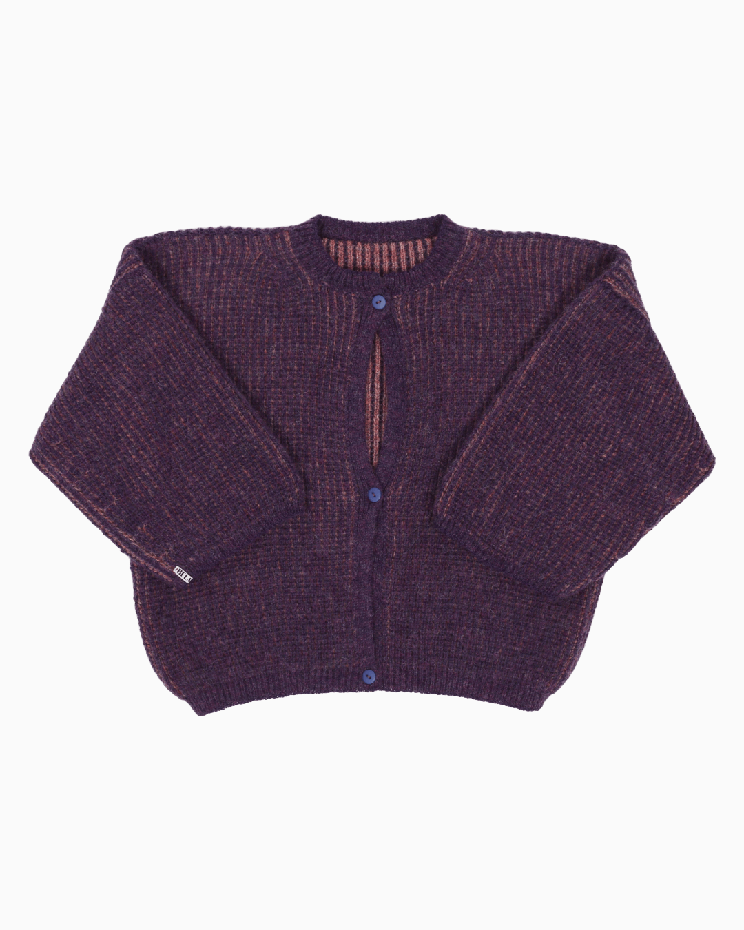 A bicolor pink and purple cardigan with a ribbed texture, 3 buttons down the front and wide 3/4 sleeves
