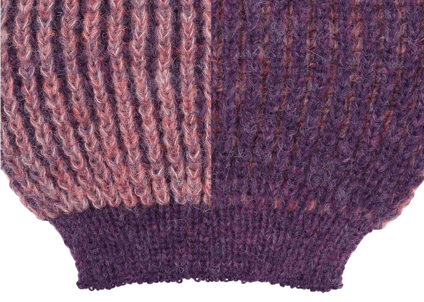 Sleeve detail of a pink and purple ribbed knit 