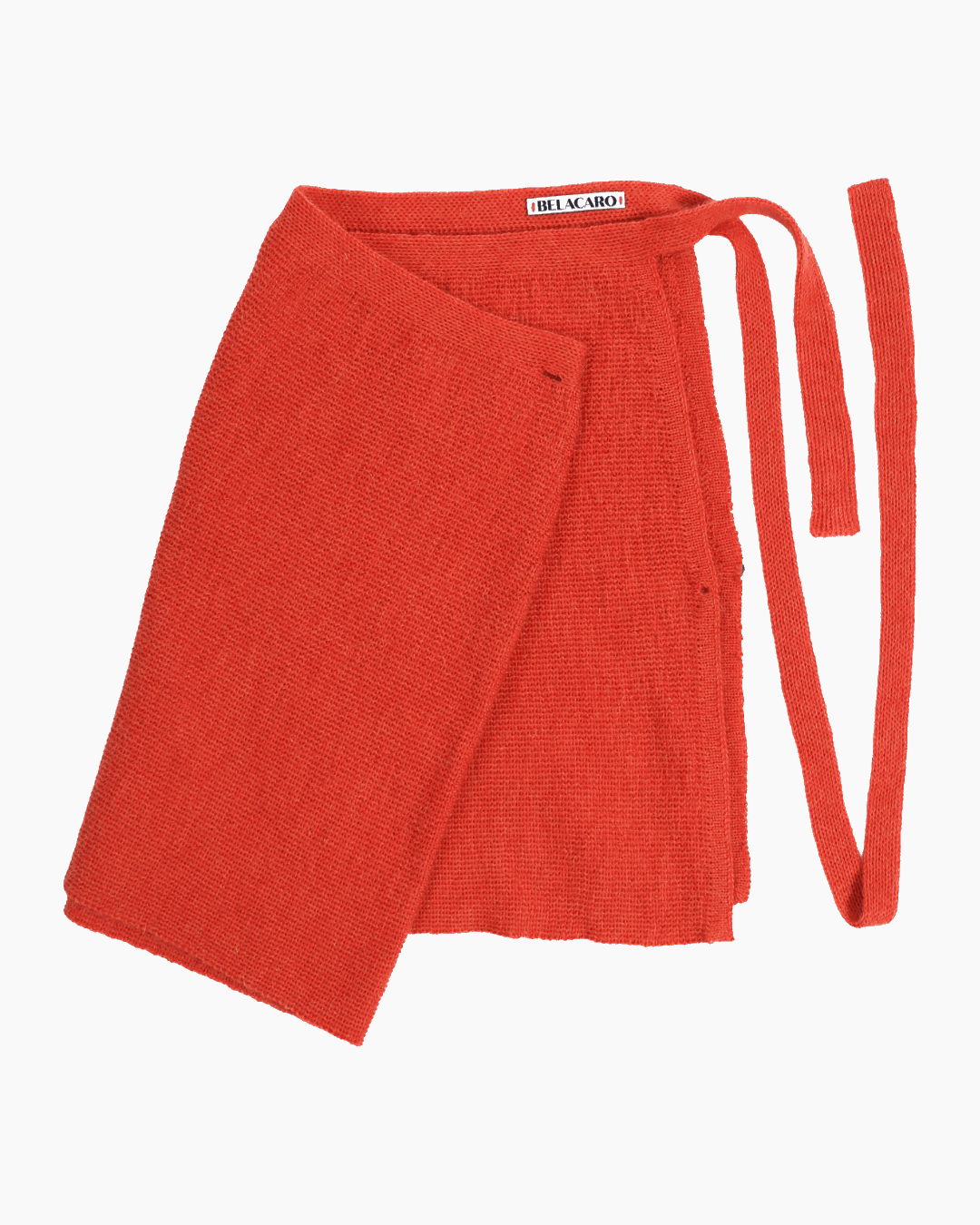 a pink knit pareo skirt on a white background