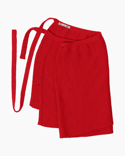 a red knit pareo skirt on a white background