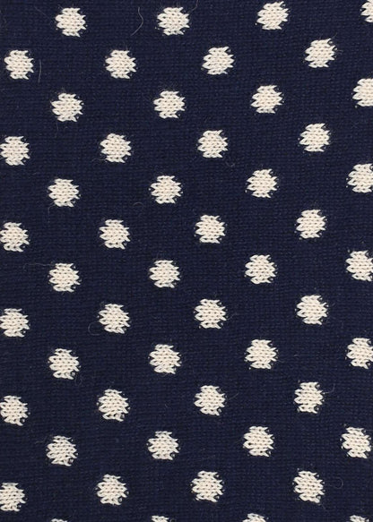 Navy blue knitted fabric with white polka dots
