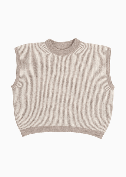 A cream and brown reversible vest without sleeves on a white background