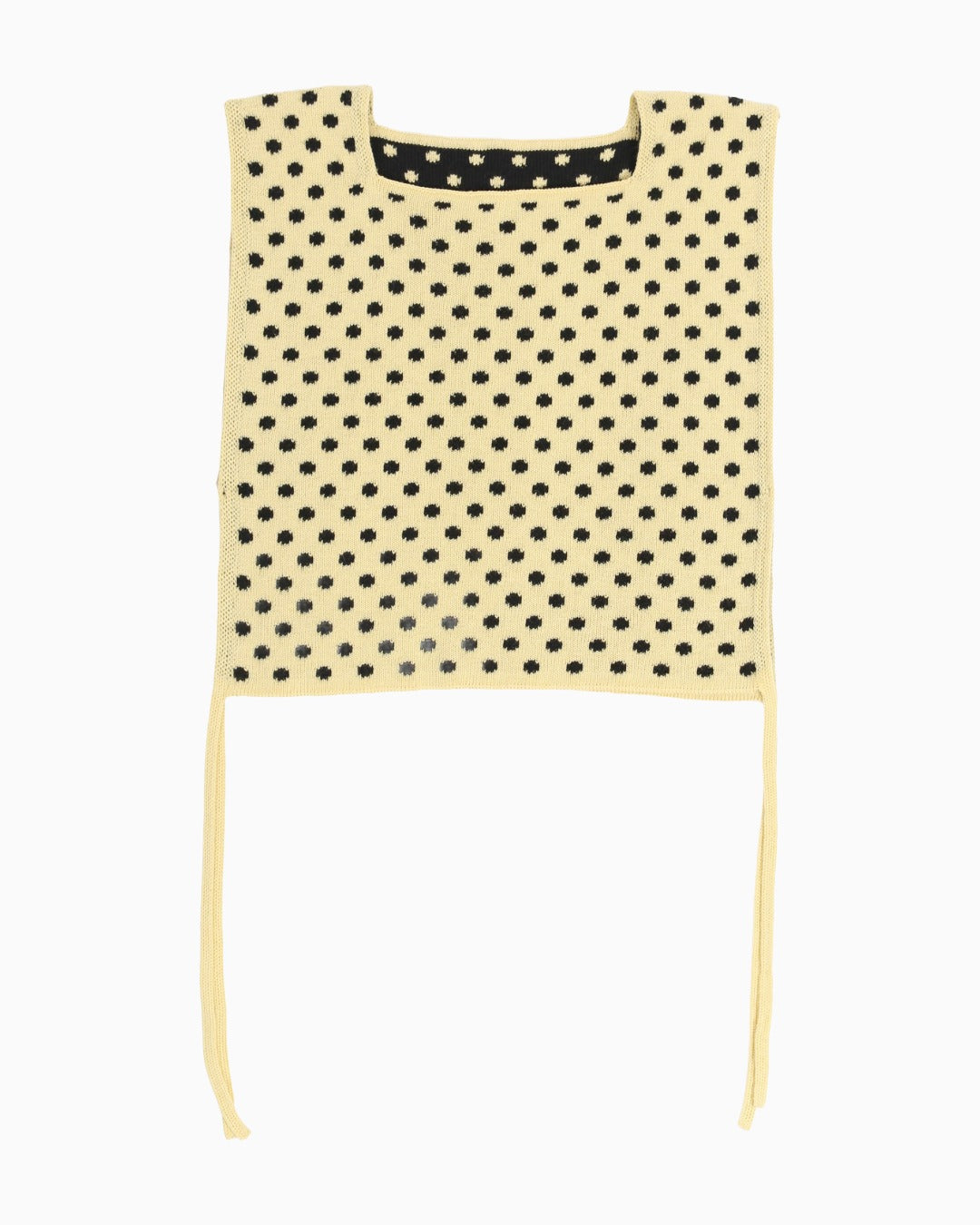 Yellow polka dot apron top with white trim on a white background