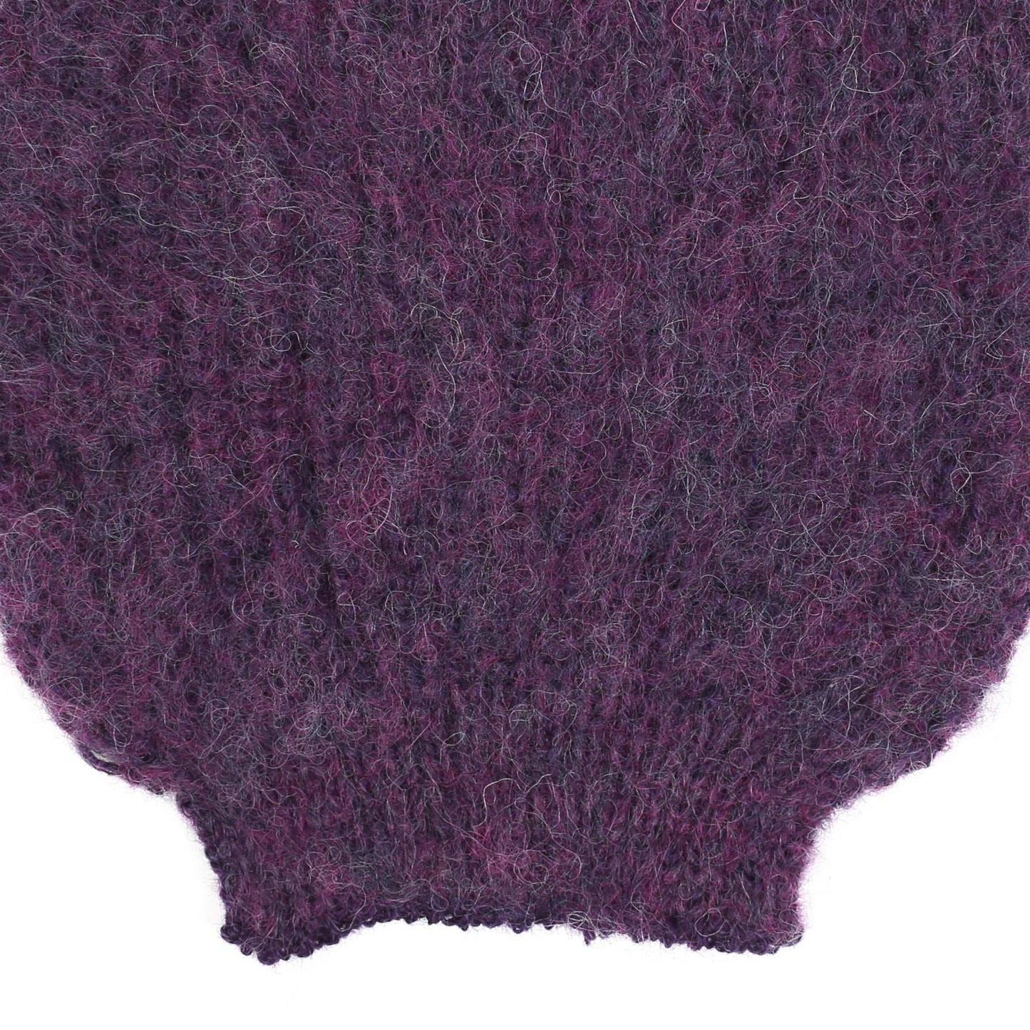 the sleeve detail of an alpaca knit purple sleeve
