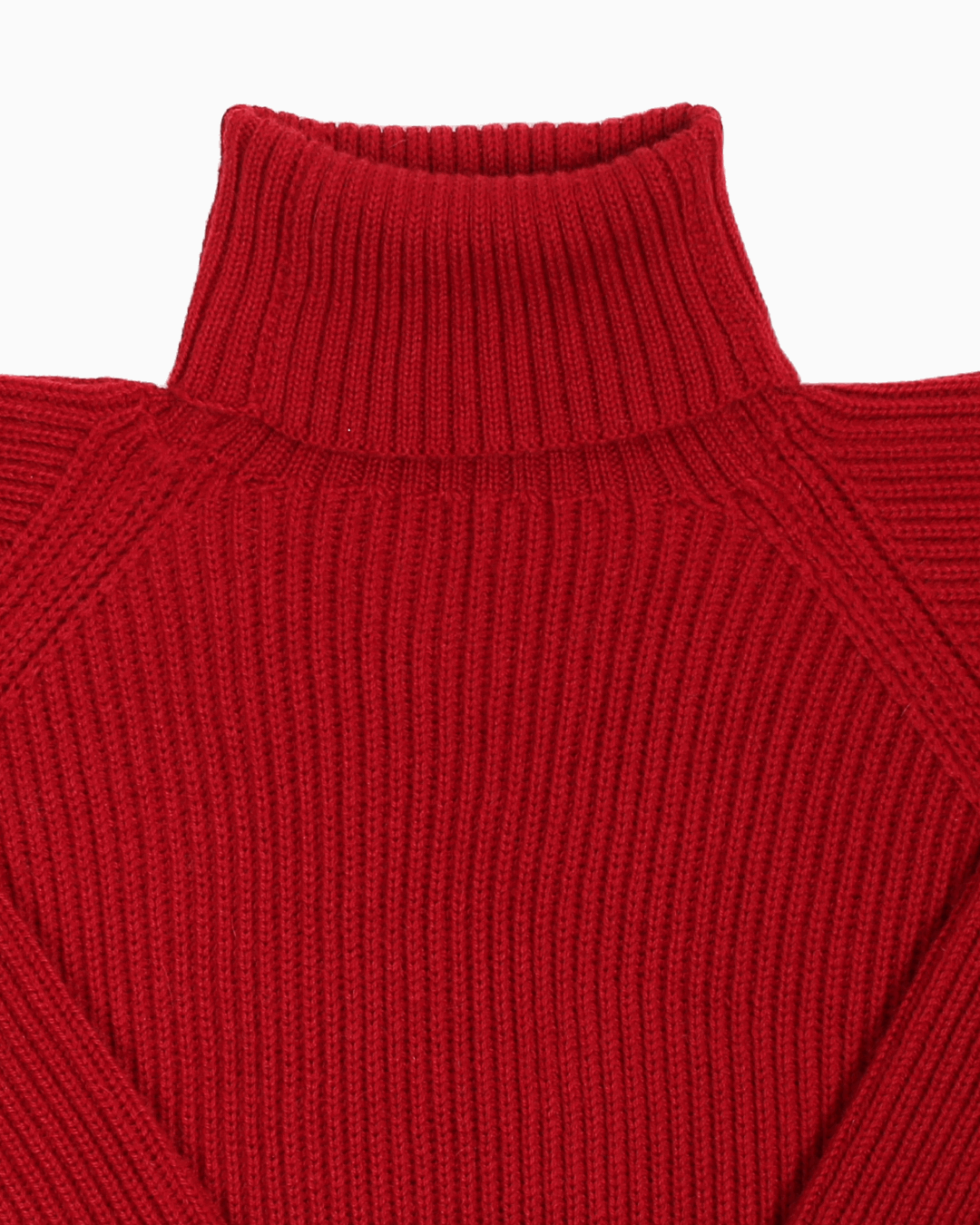 Collar detail of a red unisex turtleneck sweater made of baby alpaca wool with a fisherman rib design.