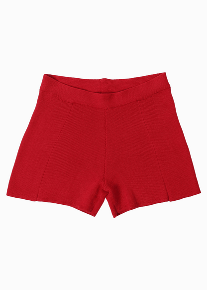 Packshot of red shorts in a knitted fabric