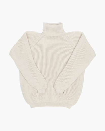 Packshot of a white unisex turtleneck sweater made of baby alpaca wool with a fisherman rib design.