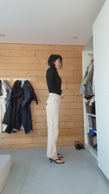 Caroline trying on the new belacaro's reversible vest on layering