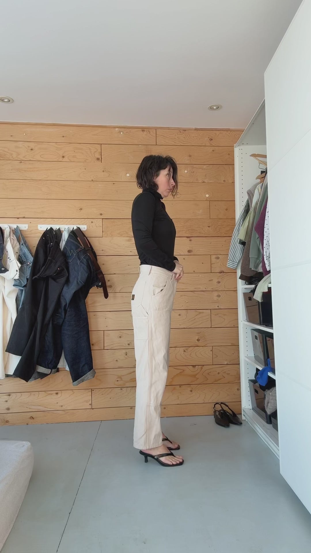 Caroline trying on the new belacaro's reversible vest on layering