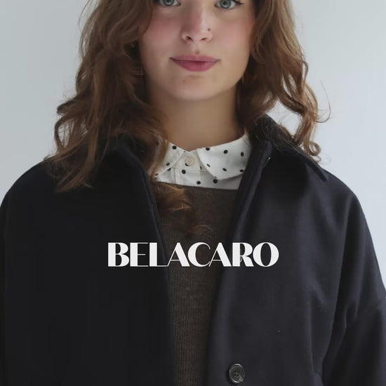 Gif of a girl wearing balaclavas of different colors